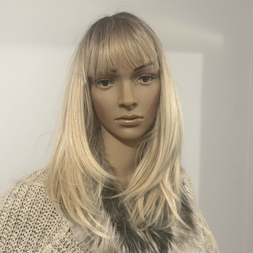 Full cap 17” wig wth bangs, nvr worn. Great for women going thru chemo